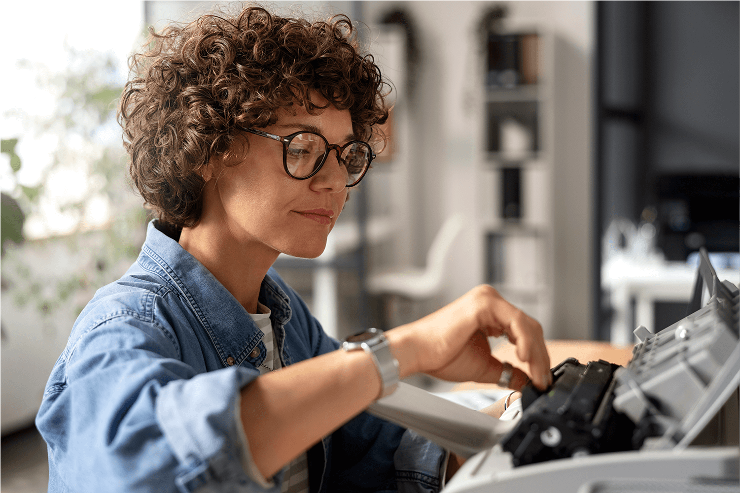 side-view-smiley-woman-using-printer 1