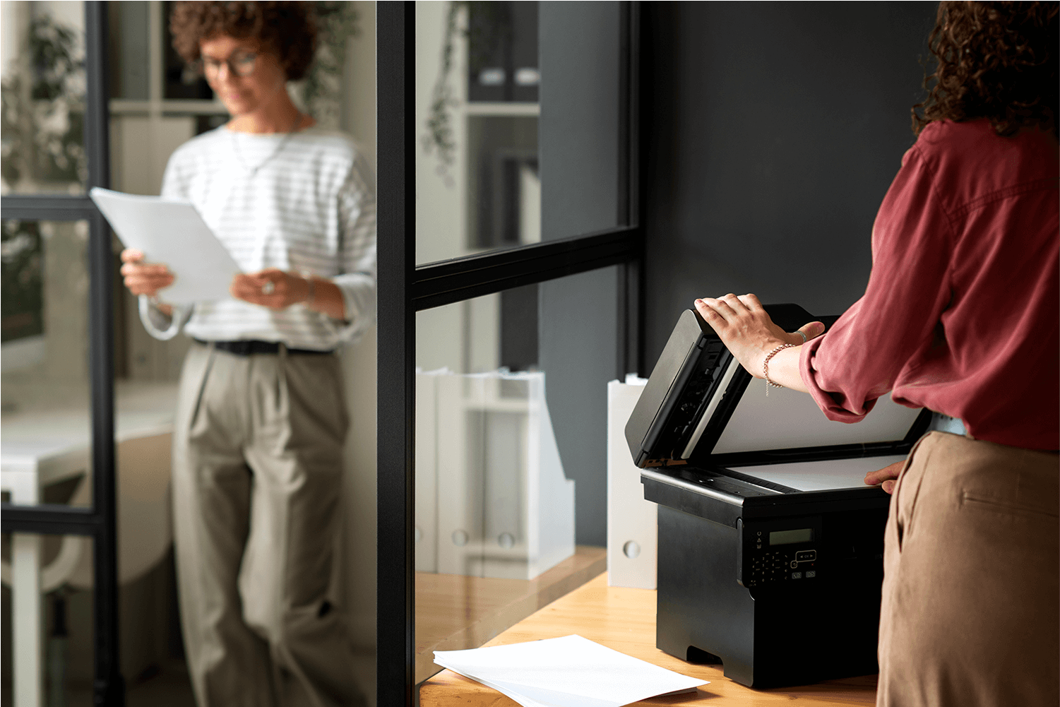 side-view-woman-using-printer